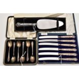 A CASED SET OF SIX GEORGE V SILVER COFFEE SPOONS, A CASED SET OF SIX SILVER KINGS PATTERN TEA KNIVES