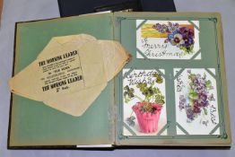 ONE ALBUM CONTAINING 192 POSTCARDS and photographic cards dating from the early 20th century,