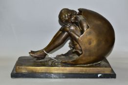 A BRONZE STUDY OF A WOMAN, in high heels, emerging from an egg, on a marble plinth, width 47cm x