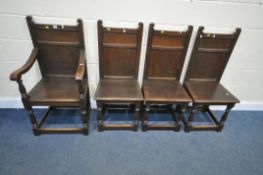 A SET OF FOUR LATE 20TH CENTURY OAK CHAIRS, including one carver, with panelled backs, on block