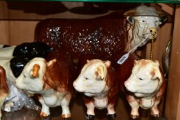 A COLLECTION OF COOPERCRAFT AND MELBA WARE BULLS, comprising three Melba Ware Hereford bulls, height