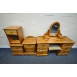A SELECTION OF PINE BEDROOM FURNITURE, to include a dressing table, with two banks of three drawers,