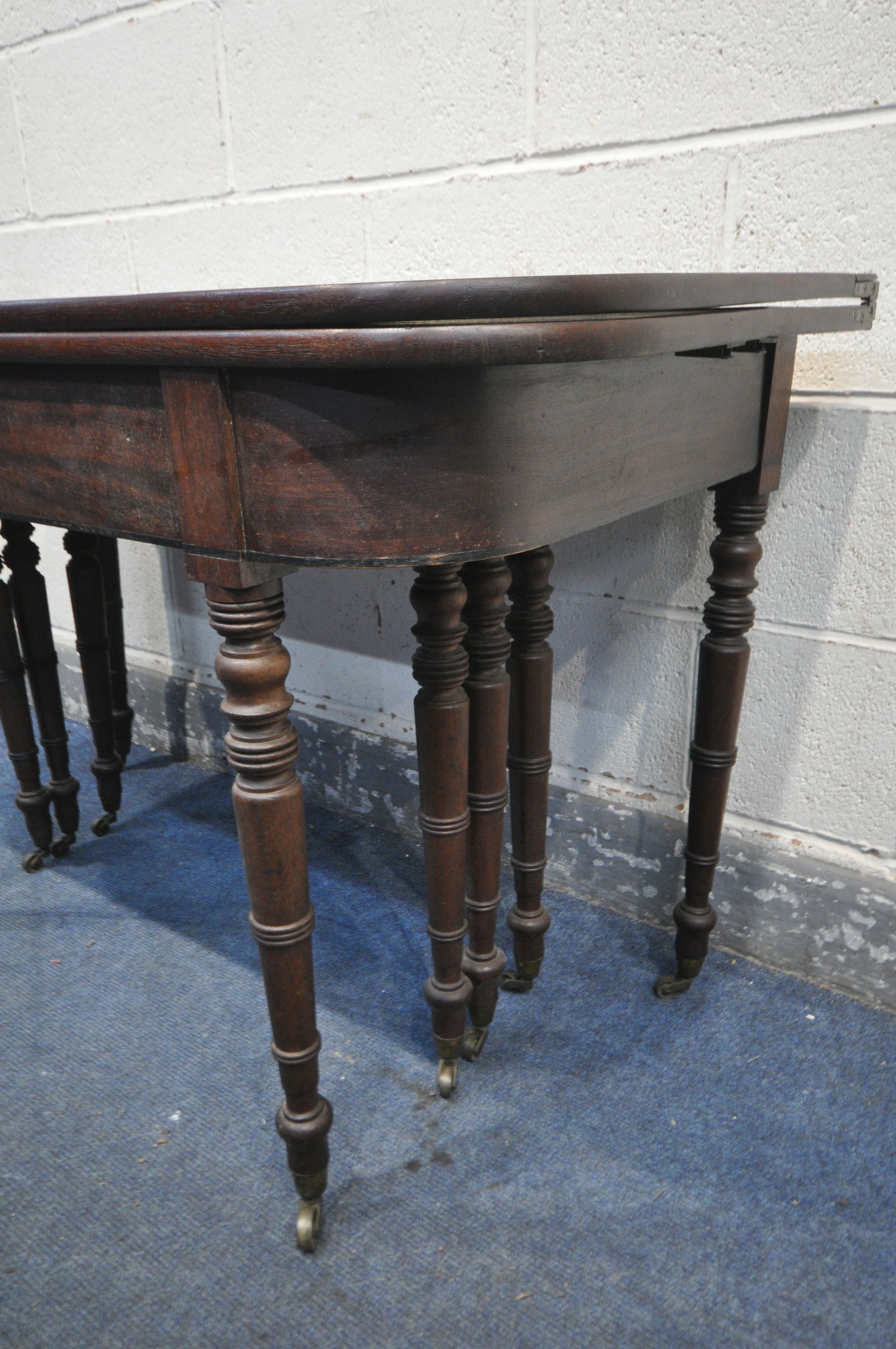 A REGENCY MAHOGANY CONCERTINA ACTION EXTENDING DINING TABLE, with two sized additional leaves, on - Image 11 of 11