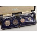 AN EXCELLENT BOXED SET OF MAUNDY MONEY EDWARD VII, four pence to one penny 1907 slight toning,