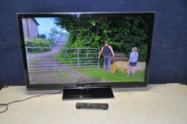 A PANASONIC TX-L39EM5B 39in TV with remote (PAT pass and working)