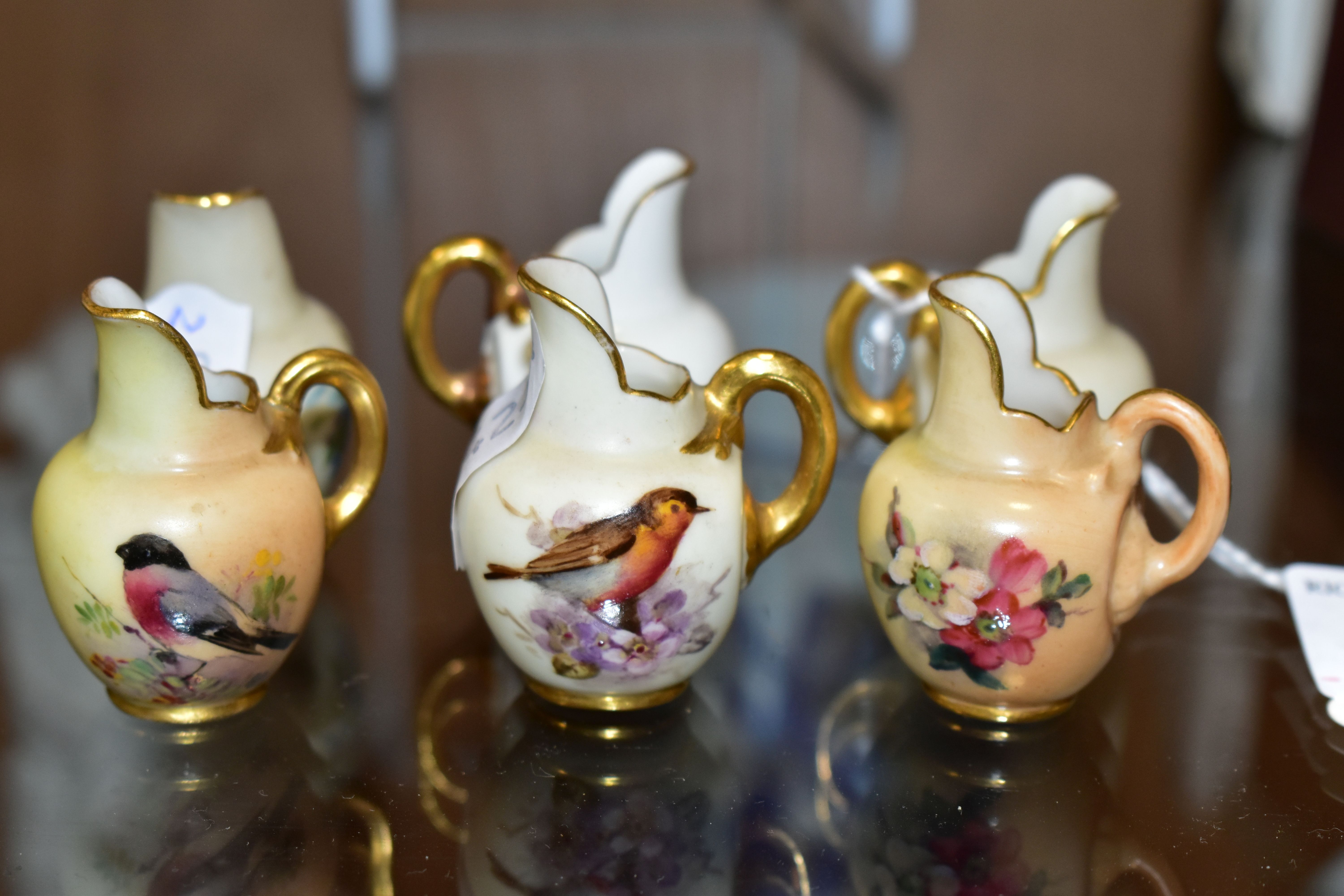 SIX ROYAL WORCESTER MINIATURE JUGS, three painted with British Birds - Bull Finch, Blue Tit and - Image 3 of 3