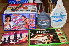 TWO BOXES AND LOOSE GAMES AND SPORTS EQUIPMENT, twelve boxed games to include Cluedo, Monopoly,