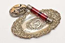 AN EDWARDIAN SILVER PIN TRAY, A LATE 19TH CENTURY DOUBLE ENDED RUBY GLASS SCENT FLASK AND A LATE