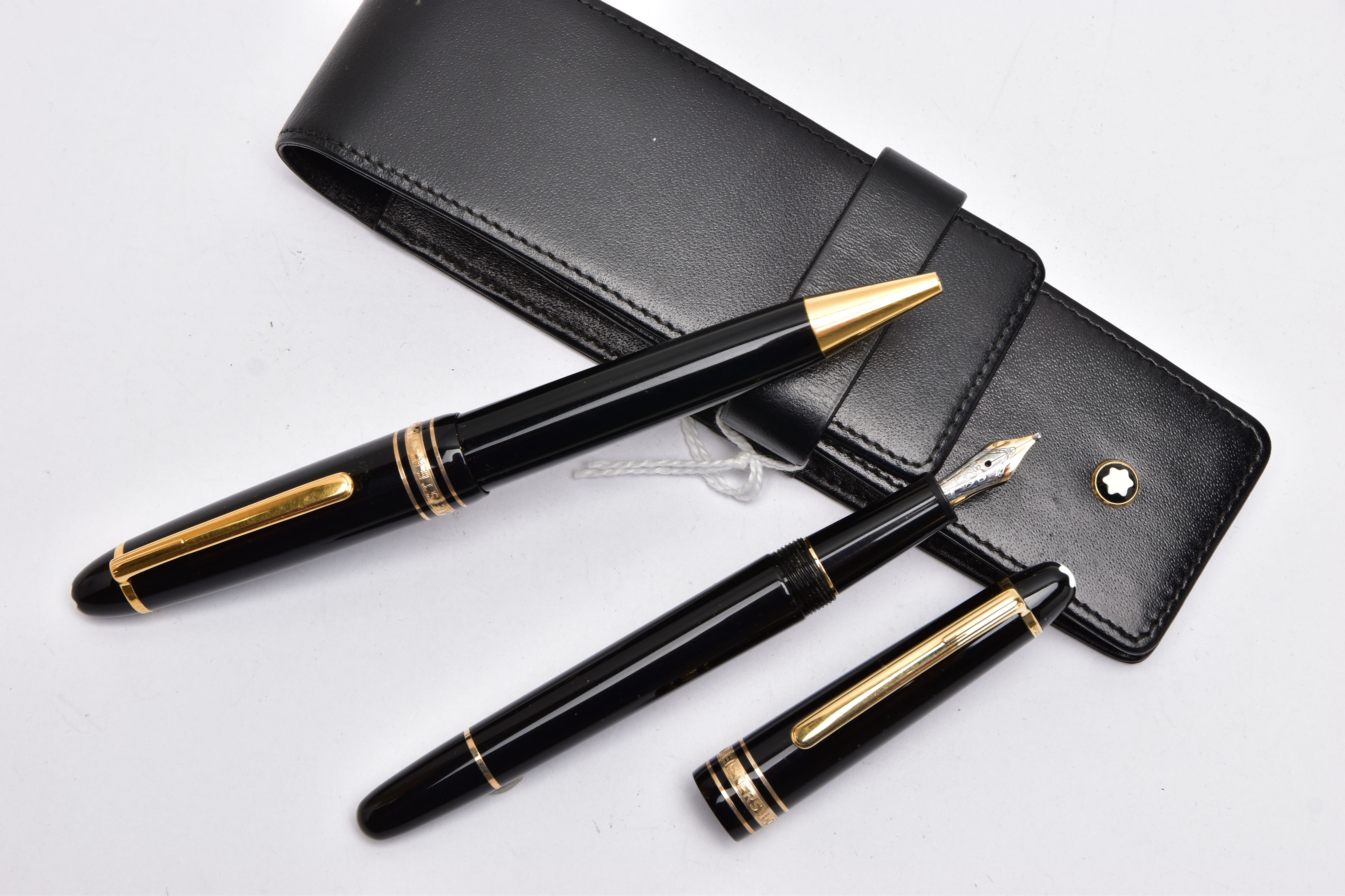 A TWO PIECE 'MONTBLANC' PEN SET, to include a black laquaer with gold detailed coller, fountain pen,