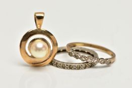 A 9CT GOLD PENDANT AND RING WITH A WHITE METAL RING, the first a yellow gold circular pendant,