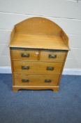 AN EARLY 20TH CENTURY ASH WASHSTAND/CHEST OF TWO SHORT OVER TWO LONG DRAWERS, with later pine raised