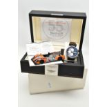 A RAIDILLON 'CONQUEST ENDURANCE' DAY DATE WRISTWATCH WITH PRESENTATION BOX, the watch with black