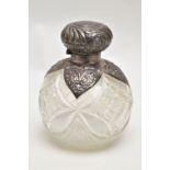 A LATE VICTORIAN SCENT BOTTLE, round glass bottle, fitted with a silver domed cover detailed with