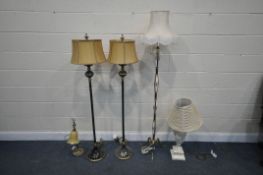 A PAIR OF ALEXANDER FLOOR STANDING LAMPS, height 154cm, another standard lamp, a heavy figural table