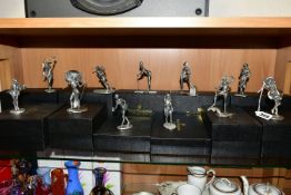 ELEVEN BOXED ROYAL HAMPSHIRE ART FOUNDRY EROTIC FEMALE FIGURINES, comprising a Detective, Indian