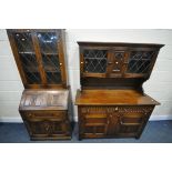 A 20TH CENTURY OAK DRESSER, the top with two lead glazed doors, base with two drawers over two