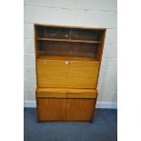 A MID CENTURY REMPLOY TEAK BUREAU BOOKCASE, with two glass sliding doors, a fall front door,