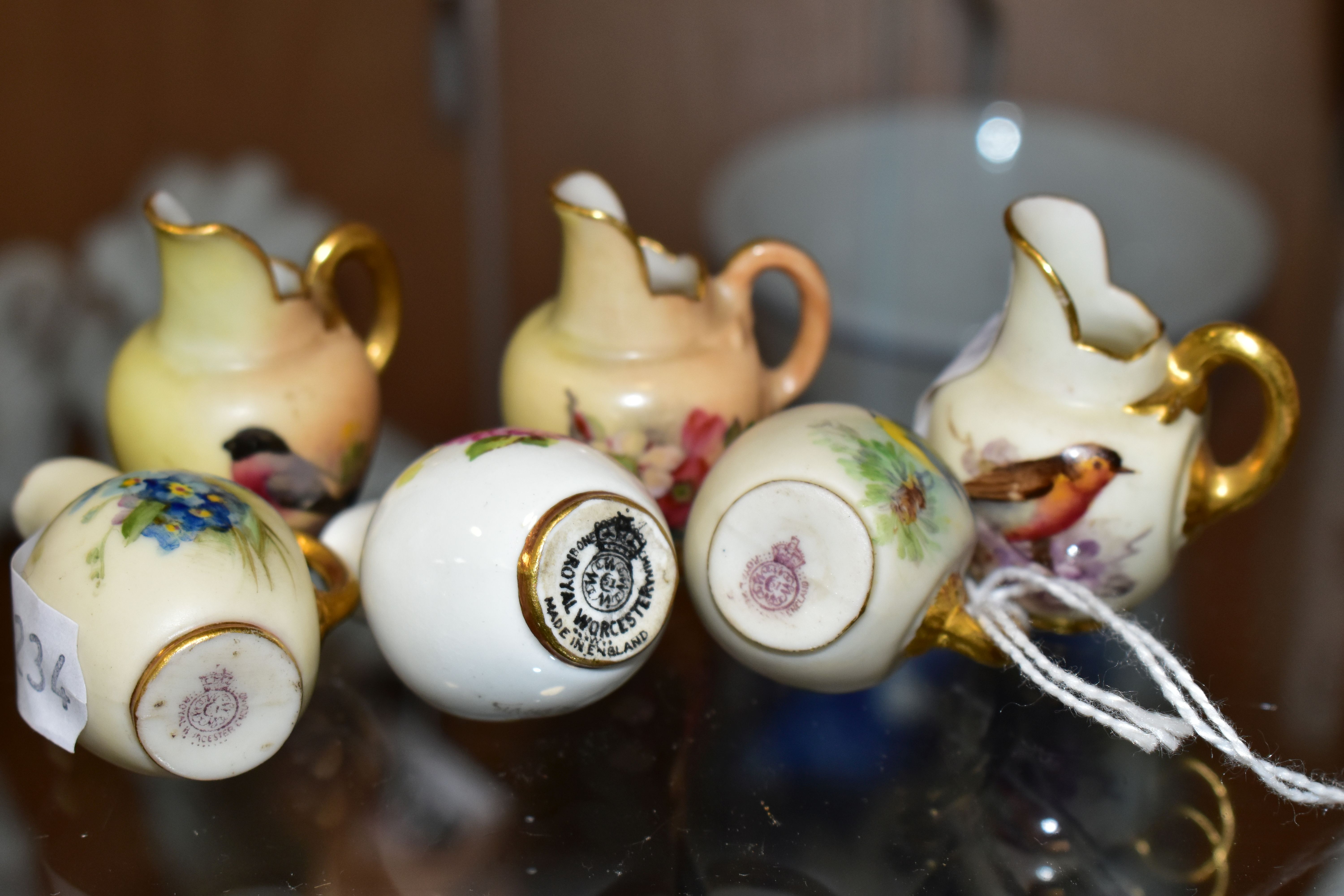 SIX ROYAL WORCESTER MINIATURE JUGS, three painted with British Birds - Bull Finch, Blue Tit and - Image 2 of 3