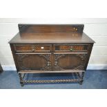 AN EARLY 20TH CENTURY OAK BARLEY TWIST SIDEBOARD, with a raised back, two drawers, and double