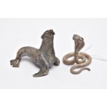 TWO WHITE METAL FIGURINES, the first a white metal python snake, decorated with a textured detail,