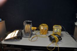 A 110V TRANSFORMER, a double extension reel, a 4 point extension cable, a 110v site light (all PAT