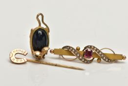 AN EARLY 20TH CENTURY BROOCH, A PENDANT AND A STICK PIN, the brooch set to the centre with a cushion