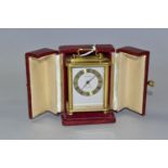 A LOOPING MINIATURE 8 DAY CARRIAGE STYLE CLOCK, in burgundy leather covered case, height of clock (