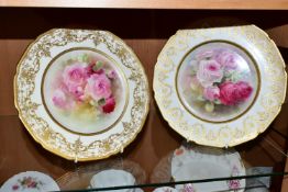 TWO ROYAL DOULTON CABINET PLATES, comprising an early 20th Century circular form plate with a gilded