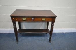 AN EDWARDIAN MAHOGANY SIDE TABLE, with two frieze drawers, on turned legs, united by an