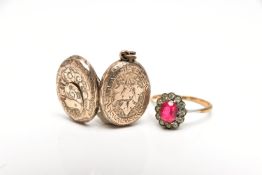 A LOCKET AND A RING, the gold front and back, oval hinged locket with floral pattern and vacant