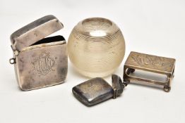 FOUR ITEMS OF SILVER / SILVER MOUNTED SMOKING RELATED ITEMS, comprising an Edwardian matchbox sleeve