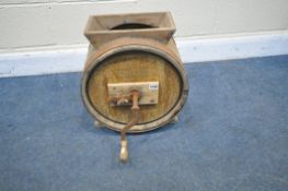 A 20TH CENTURY METAL BOUND BUTTER CHURN, with winding handle, diameter 40cm depth 30cm x height 42cm