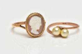 TWO GEM SET RINGS, the first a yellow metal ring set with two imitation pearls in a bypass mount,