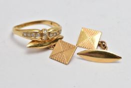 A YELLOW METAL RING AND A PAIR OF CUFFLINKS, the ring set with colourless pastes, to a polished