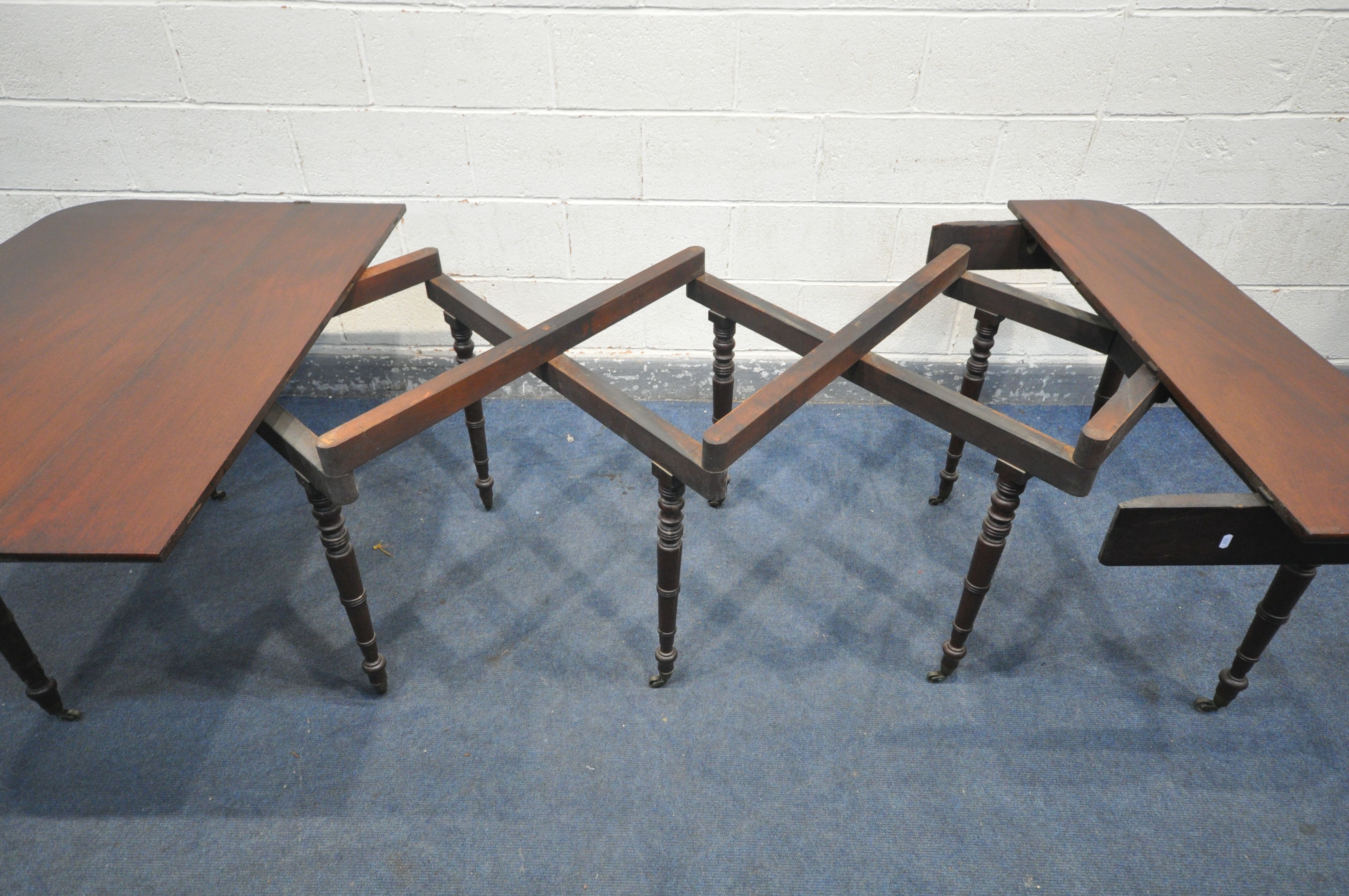 A REGENCY MAHOGANY CONCERTINA ACTION EXTENDING DINING TABLE, with two sized additional leaves, on - Image 4 of 11