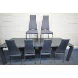 A CALLIGARIS ESTESO GRAPHITE GLASS EXTENDING TABLE, with a pull out leaves, on a smart mechanism,