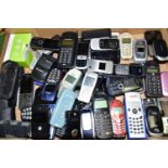 TWO TRAYS CONTAINING MOBILE PHONES AND CHARGERS including a Blackberry Curve, Motorola MG-1-4A11,