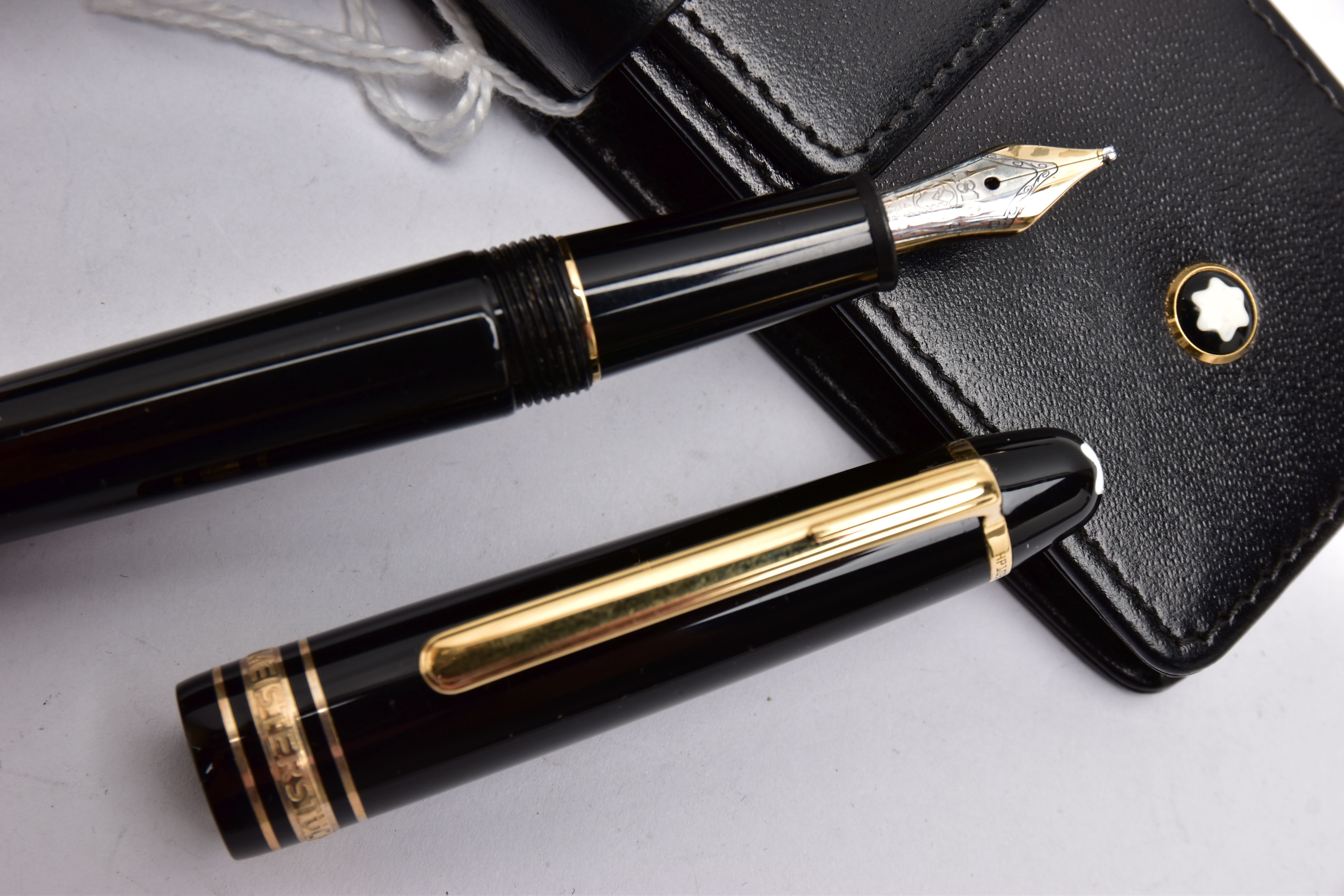 A TWO PIECE 'MONTBLANC' PEN SET, to include a black laquaer with gold detailed coller, fountain pen, - Image 2 of 4
