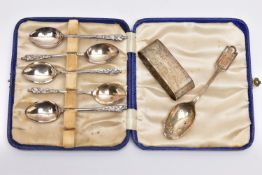 AN INCOMPLETE SET OF GEORGE V APOSTLE TOP TEASPOONS, ANOTHER SILVER TEASPOON AND A SILVER NAPKIN