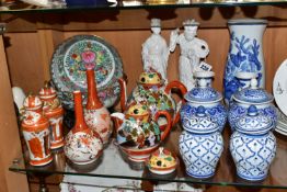 A GROUP OF ORIENTAL CERAMICS, to include two Blanc de Chine figurines, height 25.5cm (some losses to