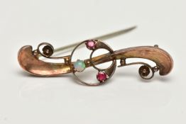 A 9CT GOLD OPAL AND RUBY BROOCH, openwork crescent to the centre set with an opal cabochon and two