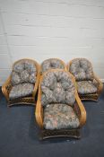 FOUR WICKER CONSERVATORY ARMCHAIRS, with floral upholstered cushions (4)