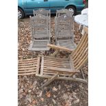 A SET OF FOUR FOLDING GARDEN CHAIRS along with a folding wooden deck chair (5)