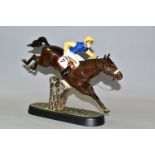A BESWICK STEEPLECHASER 2505 FIGURE, of a jockey and racehorse jumping a fence, printed black