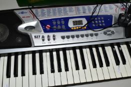 A GEAR4MUSIC MK-2000 DIGITAL ELECTRONIC KEYBOARD, with power supply and a holdall containing two