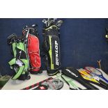 THREE JUNIOR GOLF BAGS containing various clubs such as Nike, Wilson, Dunlop, J-Tek and Masters