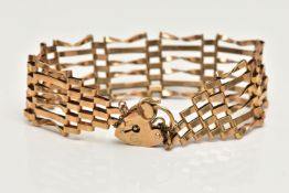 A 9CT GOLD GATE BRACELET, six bar bracelet, fitted with a heart padlock clasp with additional safety