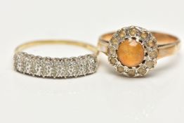 TWO GEM SET RINGS, the first a cluster ring set with a central, circular cut orange stone in a
