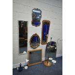 A SELECTION OF WALL MIRRORS, of various sizes, and materials, along with a mid century teak standard