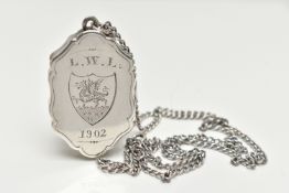 A SILVER VINAIGERETTE PENDANT, lozenge form with scalloped edges, engraved with foliage detail to